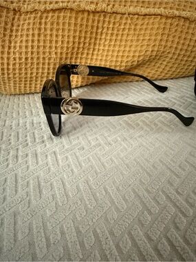 Gucci Glossy Black Round Sunglasses with Silver GG Emblem